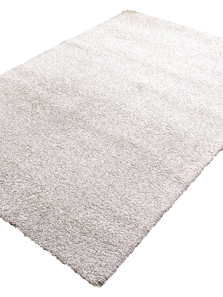 Fuzzy - Size: 7.8 x 5.3 to 7.11 x 5.3 - Imam Carpet Co