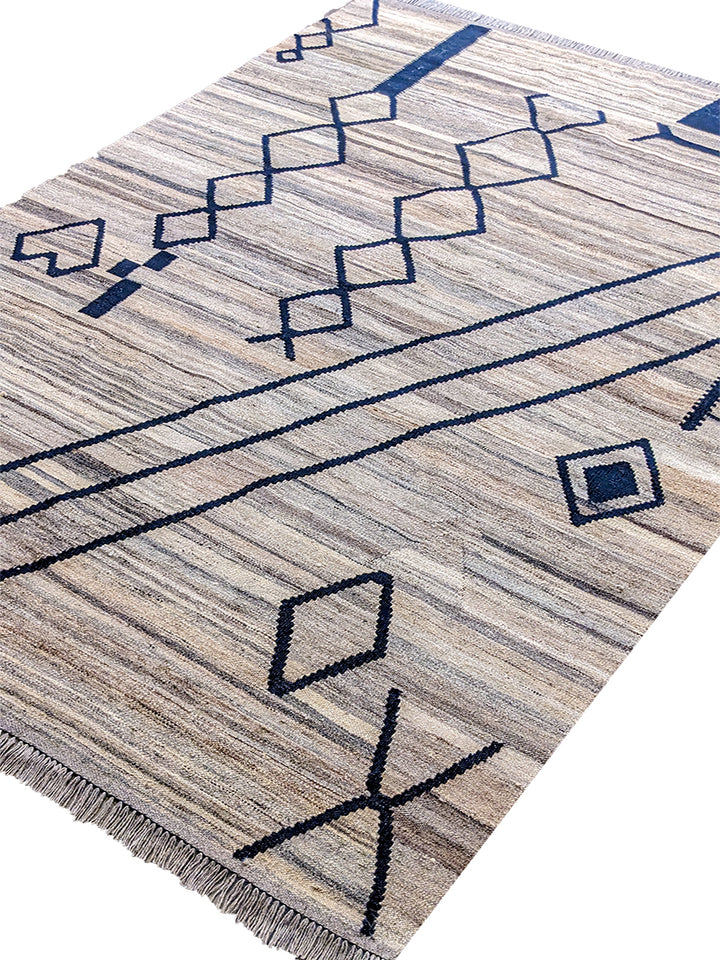 Futura - Size: 8.1 x 5.7 - Imam Carpet Co
